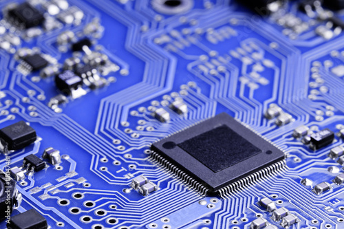 Картината върху платно A micro chip on an electronic board