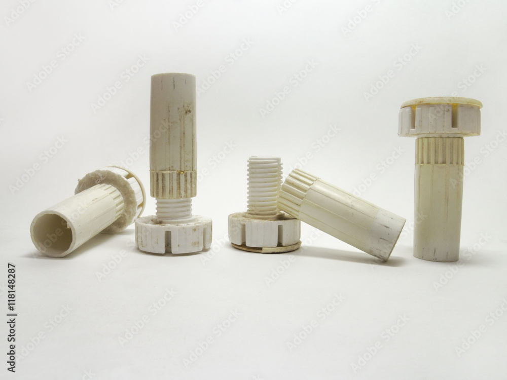 Naklejka premium Plastic adjustable legs columns for furniture