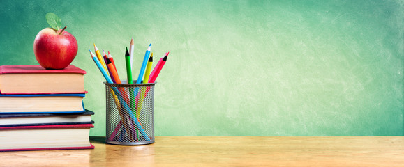 Apple On Stack Of Books With Pencils And Blank Chalkboard - Back To School
