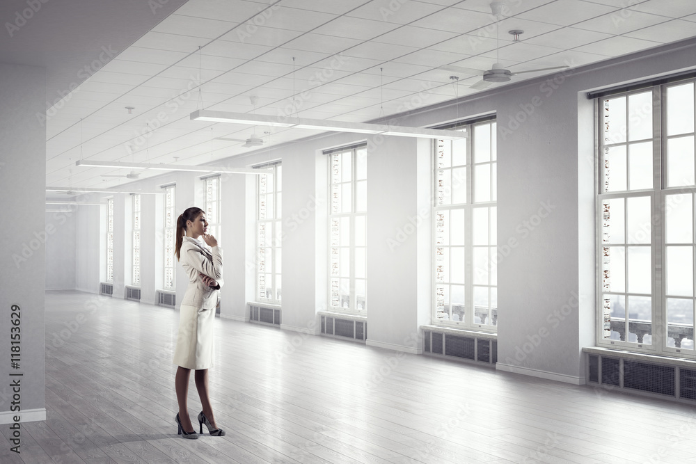 Businesswoman in modern office . Mixed media Businesswoman in modern office . Mixed media