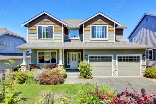 Fotografie Curb appeal of luxury family house with nice landscape.