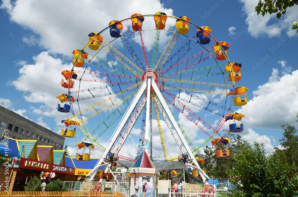 Chita, RU - Jul.17,2014: Ferris wheel in summer park of culture in the city of Chita, Russia