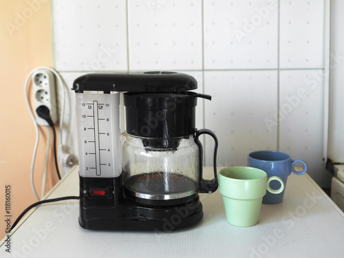 Fotografering Coffee Maker And Mugs