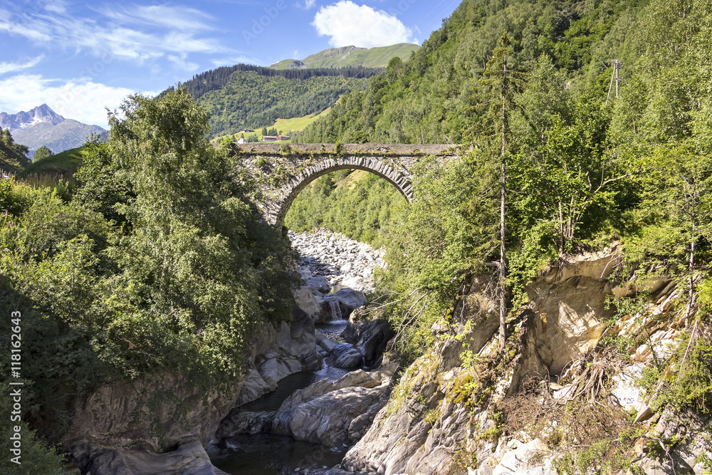 Little Creek in the European Alps with Bridge Little Creek in the European Alps with Bridge
