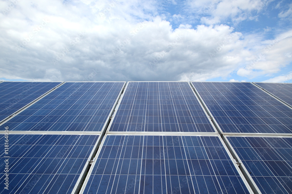 Solar panels. Sunlight gleams off solar panel. Close-up. Solar panels. Sunlight gleams off solar panel. Close-up.