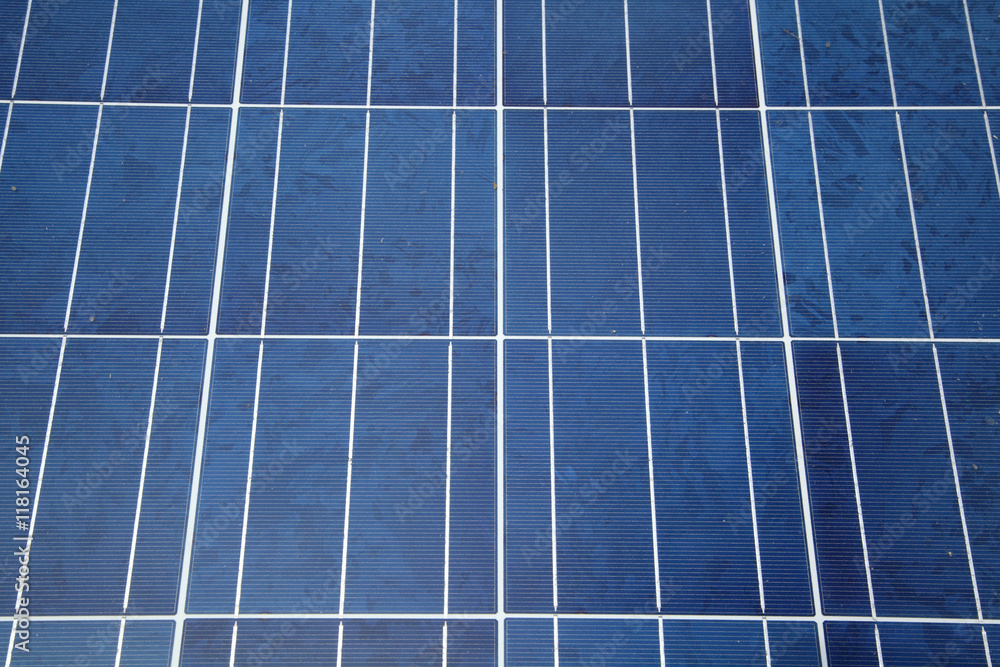 Solar panels. Sunlight gleams off solar panel. Close-up. Shallow depth of field. Solar panels. Sunlight gleams off solar panel. Close-up. Shallow depth of field.