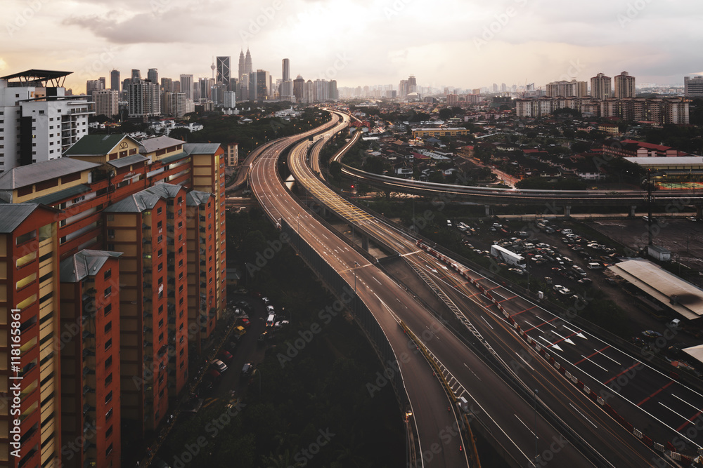Fototapeta premium A city was shining by the sun light during golden hour