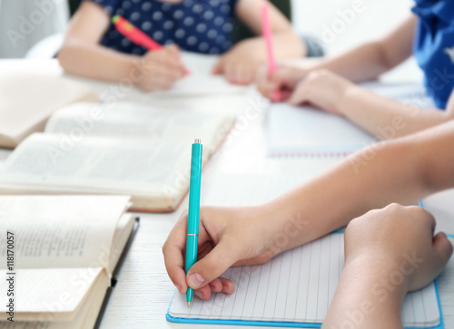 Children doing homework, closeup