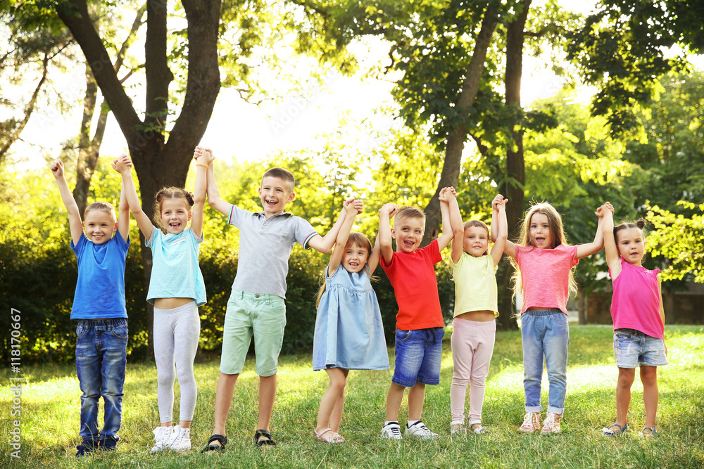 Group of happy kids in park Group of happy kids in park