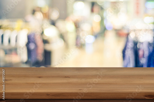 Empty table and blurred store with bokeh background