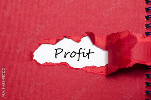 The word profit appearing behind torn paper photo