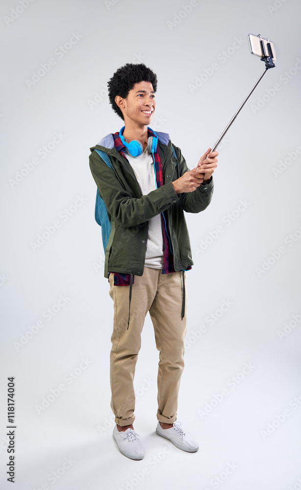 Young tourist man taking selfie with mobile cell phone Young tourist man taking selfie with mobile cell phone