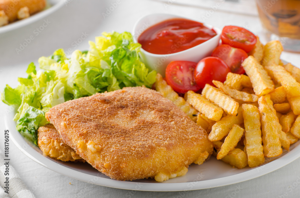 Fried cheese with french fries and lettuce Fried cheese with french fries and lettuce
