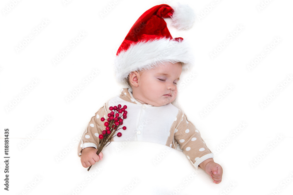 Photos of young baby in a Santa Claus hat on white blanket

