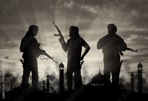 Silhouette of armed men attacking mosque