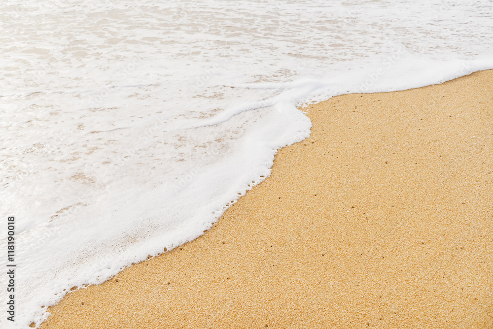 White sand beach and wave of the sea White sand beach and wave of the sea