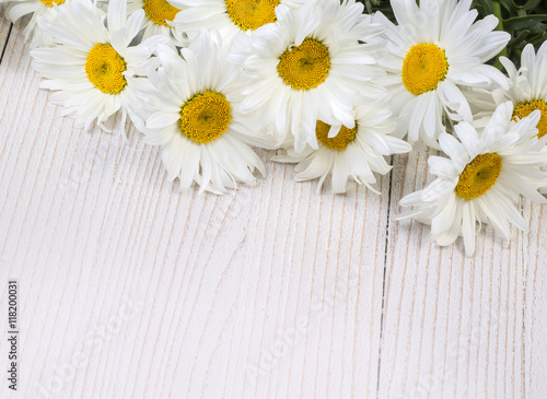 Chamomile flowers on wooden
