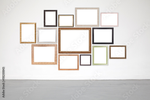 Classic frame on white cement wall in showroom and gallery.