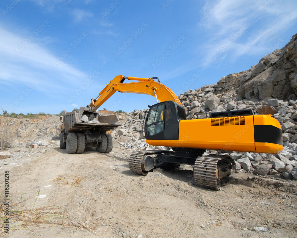 Obraz premium excavator in a granite quarry