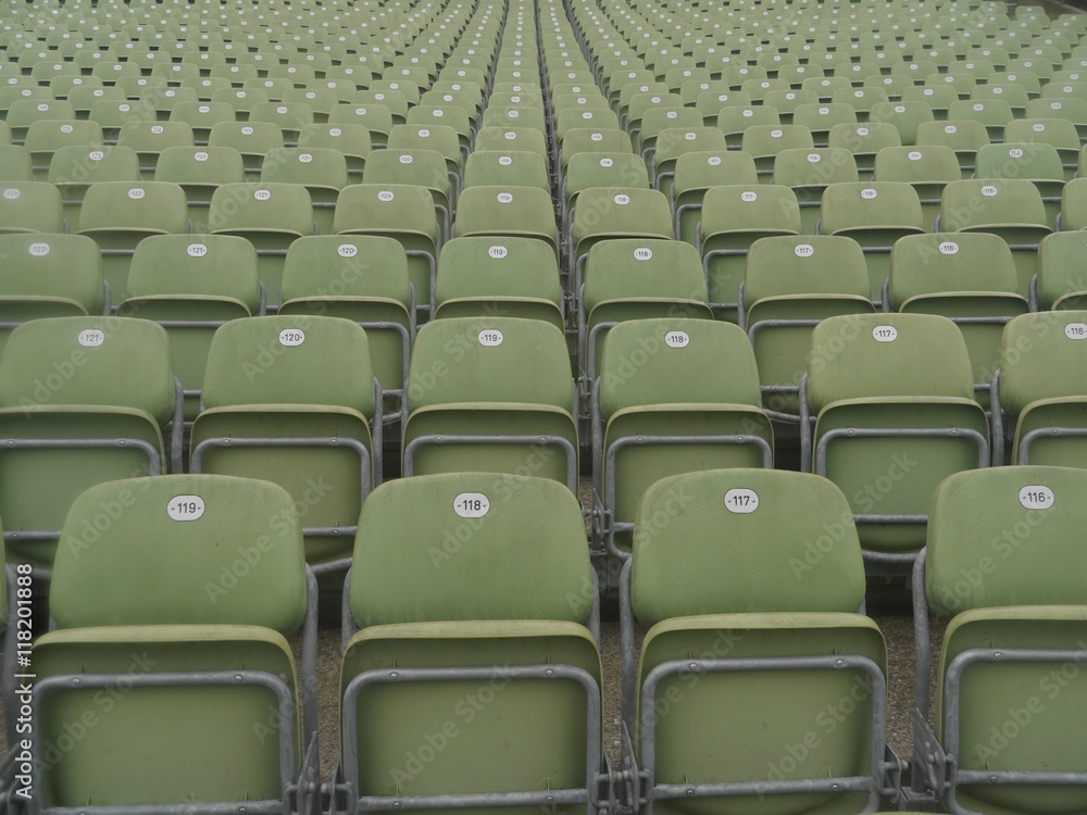 Naklejka premium empty stadium chairs bad weather