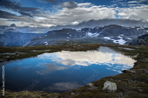 Fototapeta Naklejka Na Ścianę i Meble -  Stunning mountain landscape with pond at beforehand. Norway, Scandinavia.