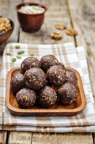 Dates cocoa coconut oats walnuts raw vegan balls