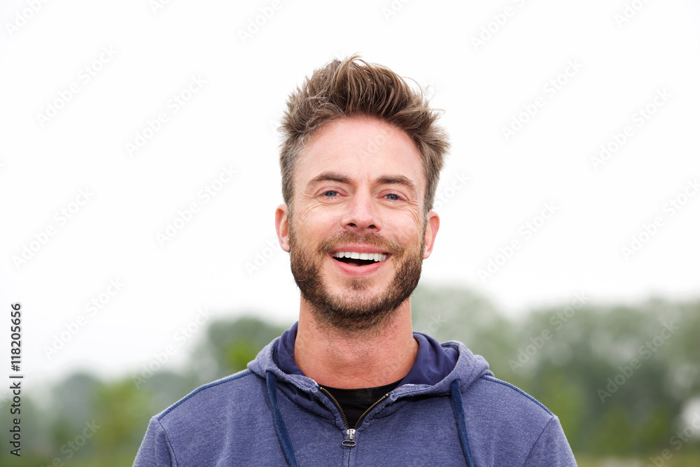 Fototapeta premium Smiling middle age athletic man