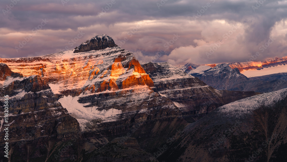 Mountain range sunrise view with colorful peaks, Rocky mountains