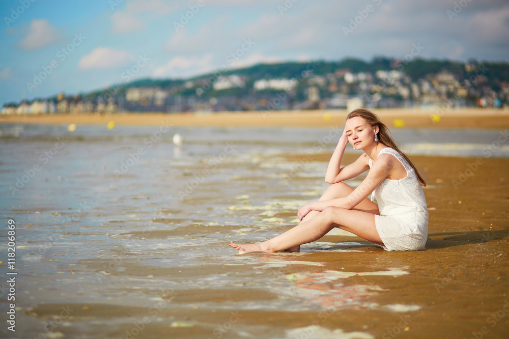 Woman enjoying her vacation by ocean or sea Woman enjoying her vacation by ocean or sea