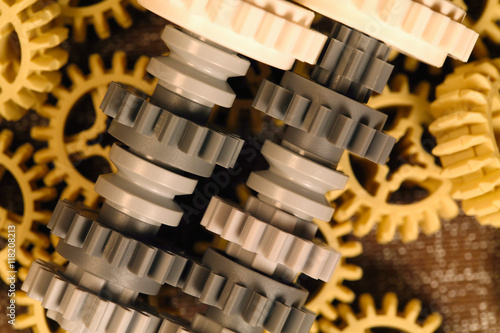 Billede på lærred Plastic differential gears on a background