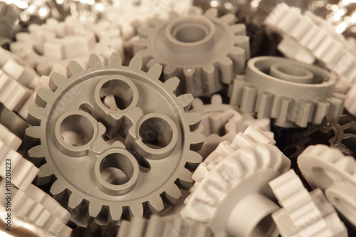 Plastic differential gears on a background 
