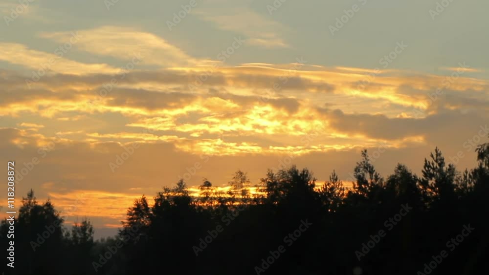 Early morning on the lake. Fog on the water and orange sky before sunrise. The lake is surrounded by forest. moving camera Early morning on the lake. Fog on the water and orange sky before sunrise. The lake is surrounded by forest. moving camera