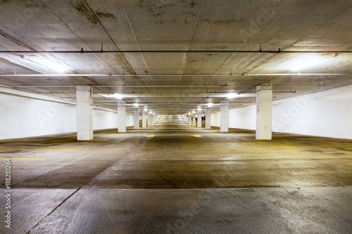 Large grungy empty undercover parking area © Ozgur Coskun