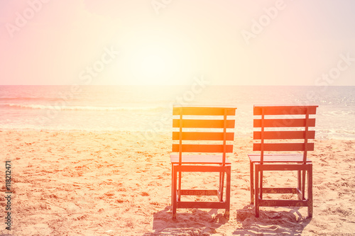 Empty Two Wood Chair on The Beach in Sunny day, Low Season Sea Travel No Tourist Concept.