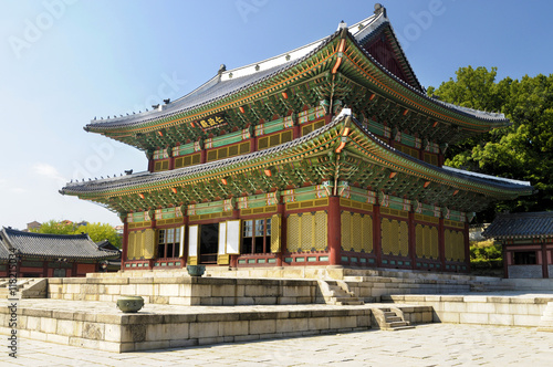 Seoul South Korea old historic tourist sight Changdeok Palace building in traditional korean painted design photo