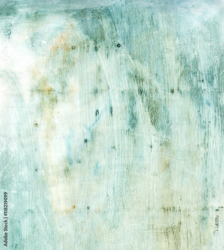 Abstract mixed media background texture in faded faded blue