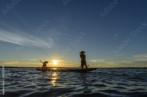 Silhouette of Fishermen in Thailand