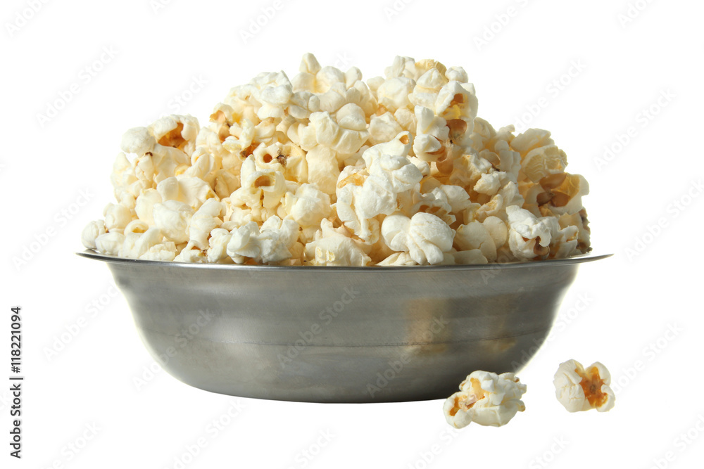 A bunch of popcorn in bowl on a white isolated background A bunch of popcorn in bowl on a white isolated background