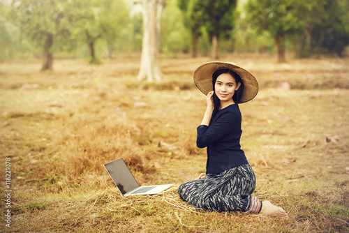 Young pretty business woman with notebook at outdoor..