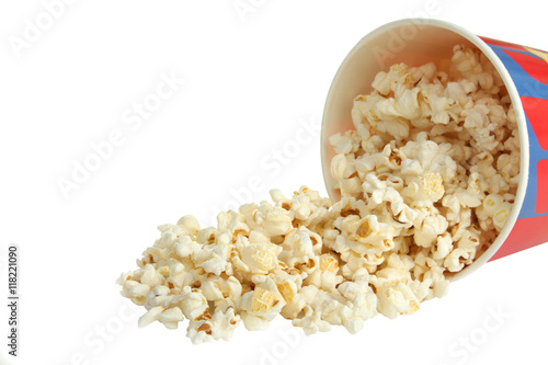 Spilled popcorn from a cup on a white isolated background