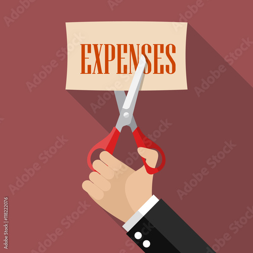 Businessman cutting expenses paper