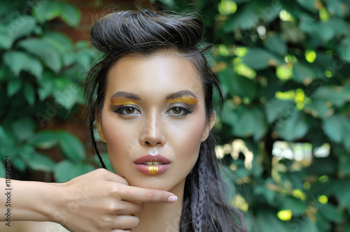 Girl shows the direction of her finger