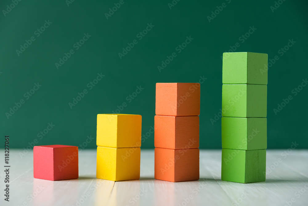 Colorful stack of wood cube building blocks Colorful stack of wood cube building blocks