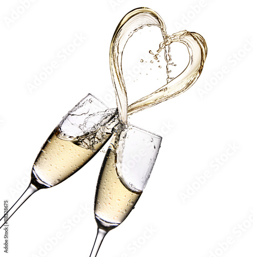 Glasses of champagne with heart shape splash isolated on a  white background