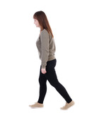 back view of walking  woman. beautiful blonde girl in motion.  backside view of person.  Rear view people collection. Isolated over white background. She goes down to the right hand.