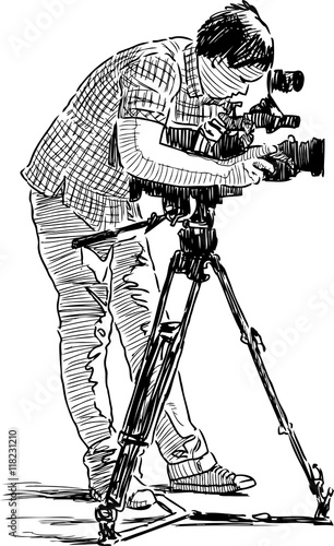 man shoots video