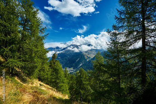 beautifull cloudy sunrise in the mountains with snow ridge. Alps. Switzerland, Trek near Matterhorn mount.