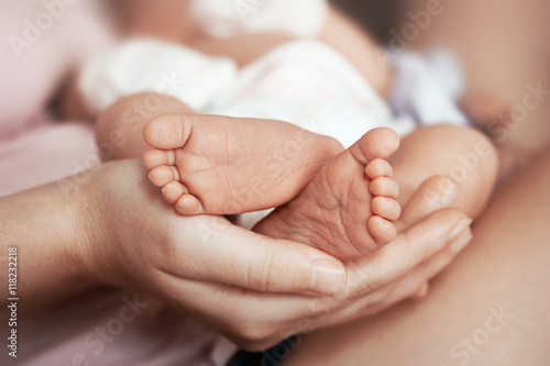 Feet of newborn baby Fototapet