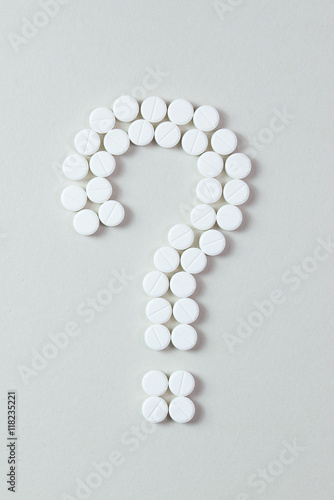 White pills question mark