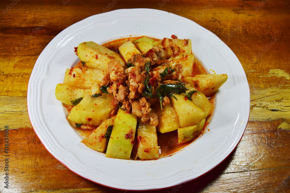 spicy stir fried winter melon with minced pork on dish spicy stir fried winter melon with minced pork on dish